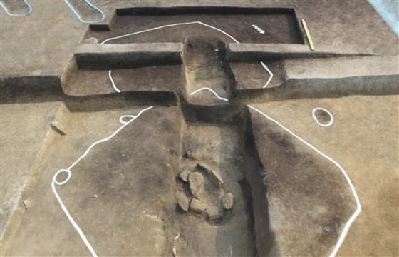 This photo from South Korea's Cultural Heritage Administration shows the remains of an old farm house in Goseong, 150 kilometers (93.2 miles) east of Seoul. The site may be up to 5,600 years old — more than 2,000 years older than what is now the second-oldest known site, which also is in South Korea. The white lines drawn with paint on the ground indicate the outline of where the house once stood.